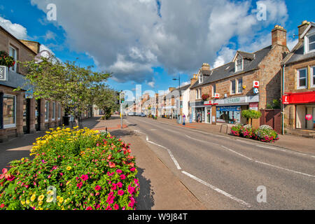 ALNESS ROSS AND CROMARTY SCOTLAND VILLAGE TOWN IN BLOOM SUPERB DISPLAYS OF COLOURFUL FLOWERS ALONG THE LENGTH OF THE HIGH STREET Stock Photo