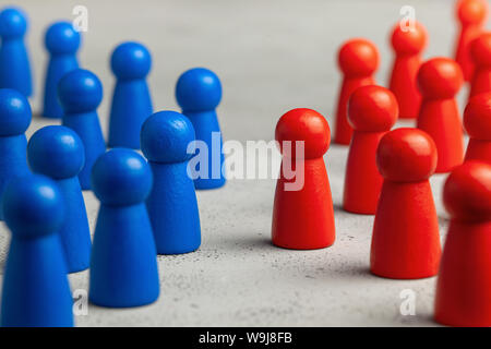 Two business teams are facing each other. The concept of competition, confrontation in business Stock Photo