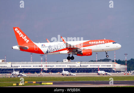 EasyJet Europe, Airbus A320-214 (OE-IVA) painted in 'Austria' special colours at Malpensa (MXP / LIMC), Milan, Italy Stock Photo