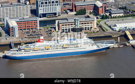 A Fred Olsen line Cruise ship, Black Watch and the Dazzle Mersey Ferry shot from the air, Liverpool, waterfront, North West England, UK