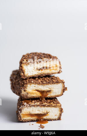 Chocolate bars with crushed peanuts and caramel stuffing Stock Photo