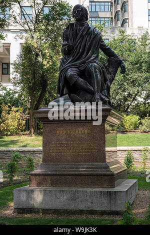 LONDON, UK - JULY 21, 2018:  Statue of Robert Burns (by Sir John Steell) in Victoria Embankment Gardens Stock Photo