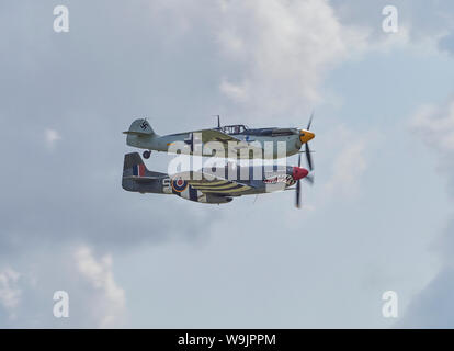 Hispano HA-112 MIL Buchon a Messerschmitt Bf 109 Me 109  with a merlin engine World War II German fighter with a North American P-51D Mustang Stock Photo