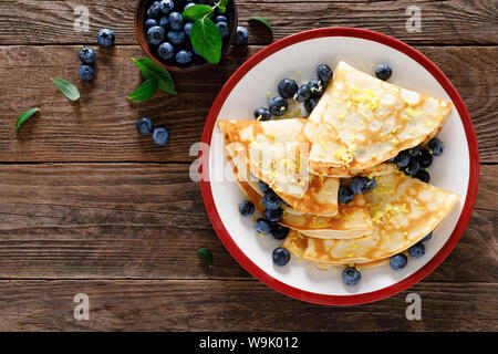 Sweet crepes filled with fresh blueberry Stock Photo