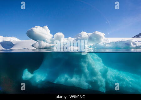 Above and below view of glacial ice near Port Lockroy, Antarctica, Polar Regions Stock Photo