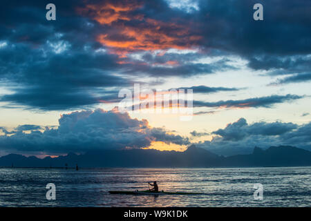 Dramatic sunset over Moorea, Papeete, Tahiti, Society Islands, French Polynesia, Pacific Stock Photo