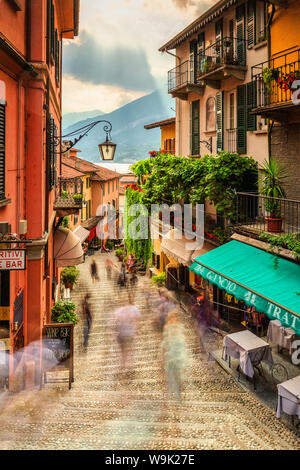 Tourists walk stairs in Bellagio, Province of Como, Lake Como, Italian Lakes, Lombardy, Italy, Europe Stock Photo