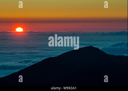 Sunrise above Haleakala National Park, Maui, Hawaii, United States of America, Pacific Stock Photo