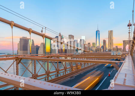 Brooklyn Bridge over East River, Lower Manhattan skyline, including Freedom Tower of World Trade Center, New York, United States of America Stock Photo