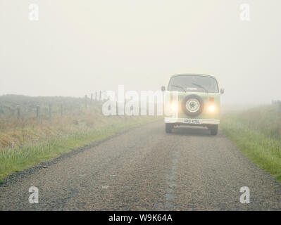 VW Camper van in the fog, Highland, Scotland, United Kingdom, Europe Stock Photo