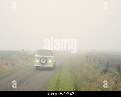 VW Camper van in the fog, Highland, Scotland, United Kingdom, Europe Stock Photo