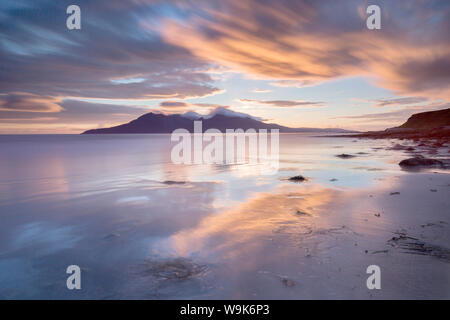 Sun setting over the Isle of Rum, Inner Isles, Inner Hebrides, Highlands, Scotland, United Kingdom, Europe