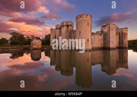 Bodiam Castle and moat, a 14th century castle at sunset, Robertsbridge, East Sussex, England, United Kingdom, Europe Stock Photo