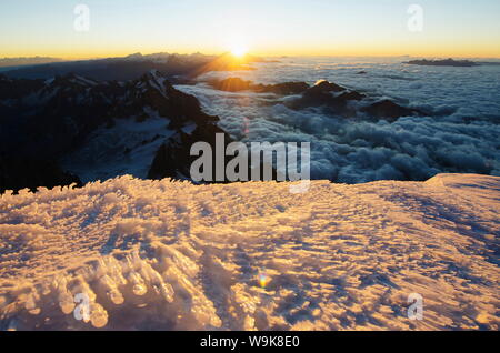 Sunrise from summit of Mont Blanc, 4810m, Haute-Savoie, French Alps, France, Europe Stock Photo