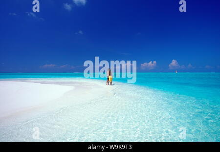Couple at the beach, Baa atoll, Maldives, Indian Ocean, Asia Stock Photo