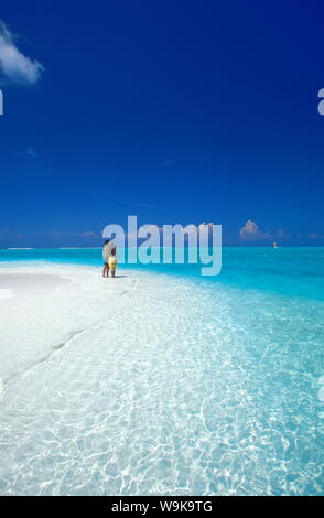 Couple at the beach, Baa atoll, Maldives, Indian Ocean, Asia Stock Photo