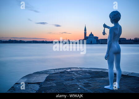 Charles Ray's Boy with Frog statue on the tip of Zattere at sunrise, Venice, UNESCO World Heritage Site, Veneto, Italy, Europe Stock Photo
