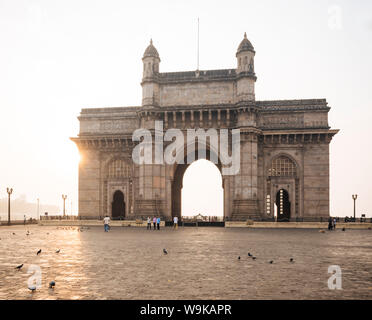 Sunrise behind The Gateway to India, Mumbai (Bombay), India, South Asia Stock Photo