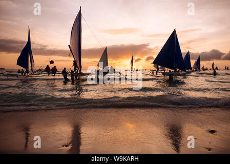 Paraw boats, White Beach, Boracay, The Visayas, Philippines, Southeast Asia, Asia Stock Photo