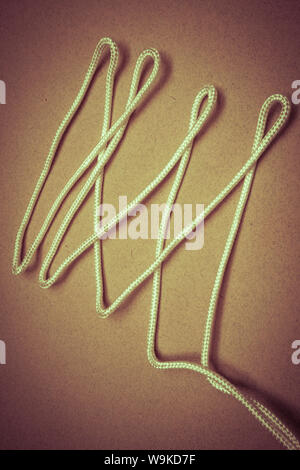 white rope randomly laid in zig zag pattern Stock Photo