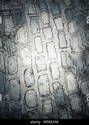 double vision full frame shot of granite cobbled street from above (layered image) Stock Photo