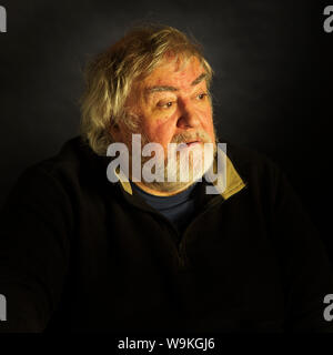 A Character Portrait of a old bearded man Stock Photo