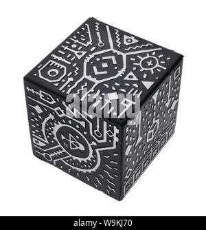 Merge cube used with an app to make holdable virtual reality objects.  Teaching adults and children to create and play. A learning tool Stock  Photo - Alamy