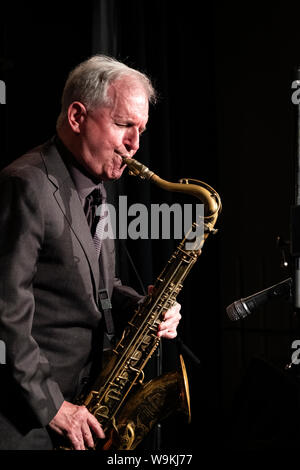 Scott Hamilton playing tenor sax with his quartet, Brecon Jazz festival 2019 Stock Photo