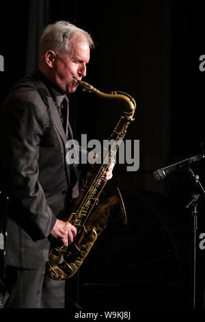 Scott Hamilton playing tenor sax with his quartet, Brecon Jazz festival 2019 Stock Photo