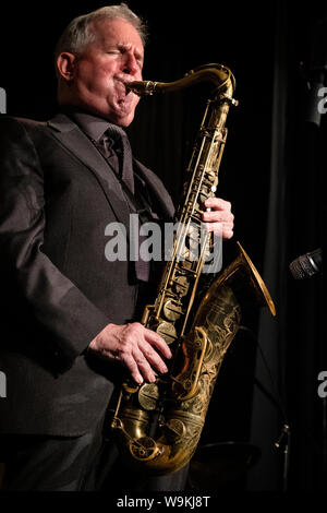 Scott Hamilton playing tenor sax with his quartet, Brecon Jazz festival 2019 Stock Photo