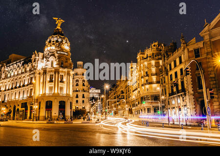 Milky way in the night sky over the famous Gran Via in Madrid, Spain Stock Photo