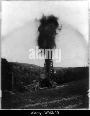 An oil well erupting Stock Photo