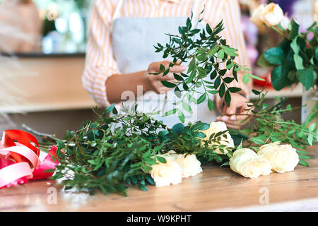 Floral business concept. young woman taking part in master class. close up cropped portrait. Stock Photo