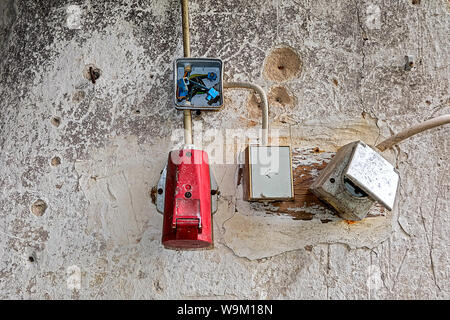 broken ailing sockets high voltage Stock Photo