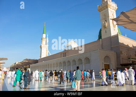 MADINAH, SAUDI ARABIA - AUGUST 2019 : Muslim pilgrims visiting the beautiful Nabawi Mosque destination, the Prophet mosque which has great architectur Stock Photo