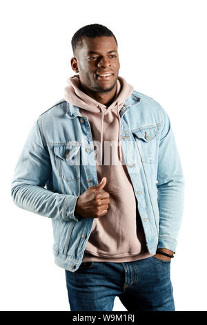 positive gorgeous macho model in trendy clothes expressing positive emotion, close up portrait. Stock Photo