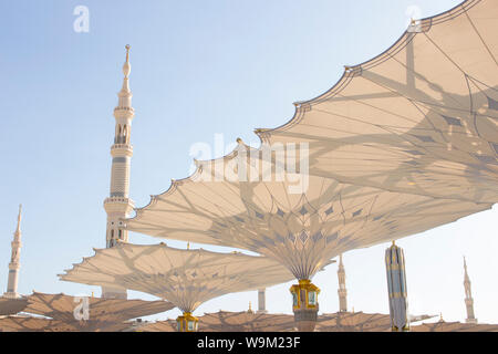 MADINAH, SAUDI ARABIA - AUGUST 2019 : Muslim pilgrims visiting the beautiful Nabawi Mosque destination, the Prophet mosque which has great architectur Stock Photo