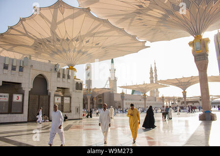 MADINAH, SAUDI ARABIA - AUGUST 2019 : Muslim pilgrims visiting the beautiful Nabawi Mosque destination, the Prophet mosque which has great architectur Stock Photo