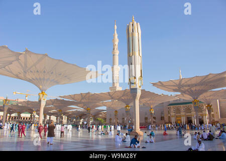 MADINAH, SAUDI ARABIA - AUGUST 2019 : Muslim pilgrims visiting the beautiful Nabawi Mosque destination, the Prophet mosque which has great architectur Stock Photo