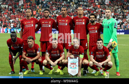 Liverpool's Fabinho (back left to right), Joe Gomez, Joel Matip, Virgil van Dijk, Mohamed Salah, Adrian, Sadio Mane (front left to right), Alex Oxlade-Chamberlain, James Milner, Jordan Henderson and Andrew Robertson pose for a photograph before kick-off in the UEFA Super Cup Final at Besiktas Park, Istanbul. Stock Photo