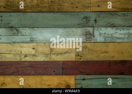 Rustic pallet wood wall with white, red, grays and tan colors for backgrounds, displays, flat lays or copy space use Stock Photo
