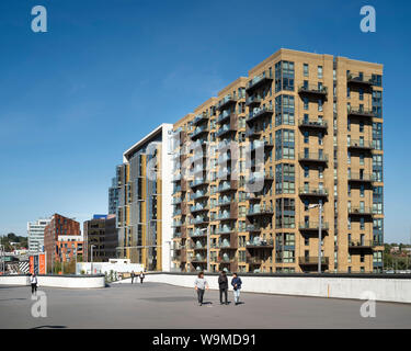 View from Wembley Stadium plaza towards multi-level apartment tower. Wembley Park Gate, London, United Kingdom. Architect: CZWG Architects LLP, 2019. Stock Photo