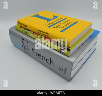 Books to learn languages: French, Italian, German. A study by Thomas Bak at Edinburgh University suggests learning a language improves brain function. Stock Photo