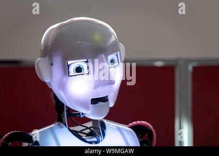 Head with the lightning eyes of humanoid robot Stock Photo