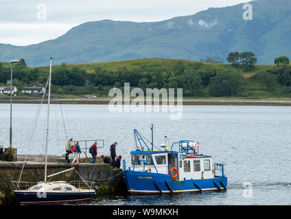 The Lismore passenger ferry prepares to depart from Port Appin pier on route to Lismore Island, Argyll. Stock Photo