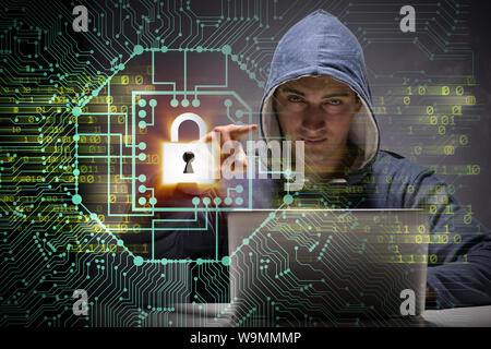 The young hacker in cybersecurty concept Stock Photo