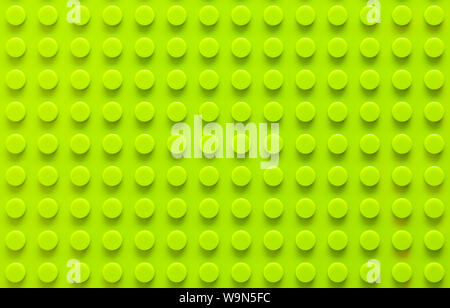 Green Toy Plastic Building Blocks Background. Stock Photo