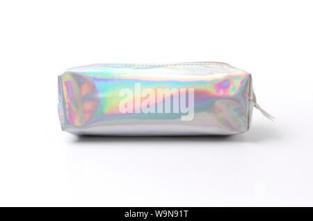 Holographic silver pencil case on white background. Stock Photo