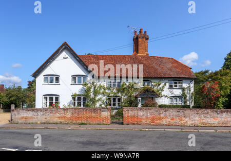 Real estate: roadside view of a large property, a white detached house, 'The Old House', Pirbright, a village near Woking and Guildford, SE England Stock Photo
