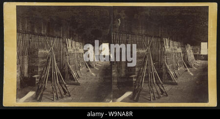 Bayoneted rifles on racks at arsenal of 134th Illinois Volunteer Infantry, Columbus, Kentucky] / From Carbutt's Garden City Photographic Gallery. 131 Lake Street, Chicago Stock Photo